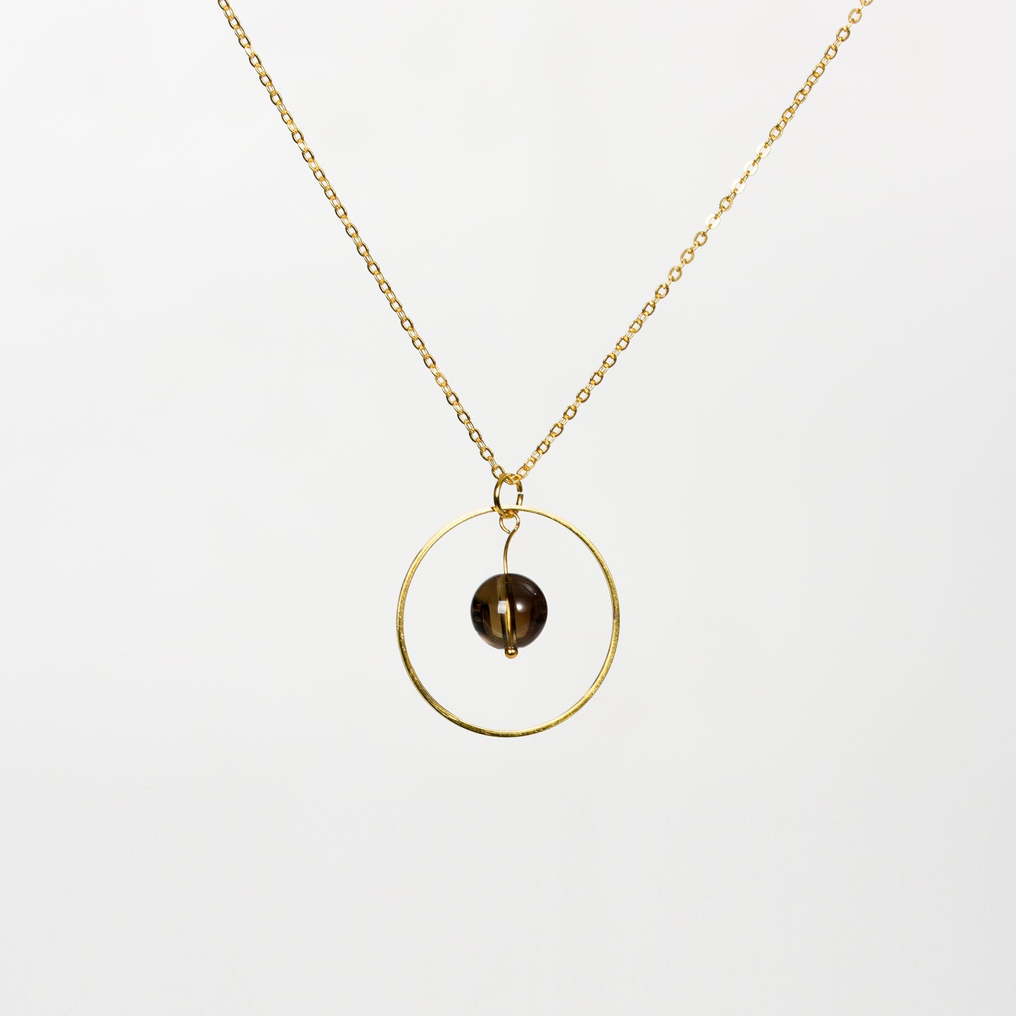 Crystla Sphere In circular ring Pendant