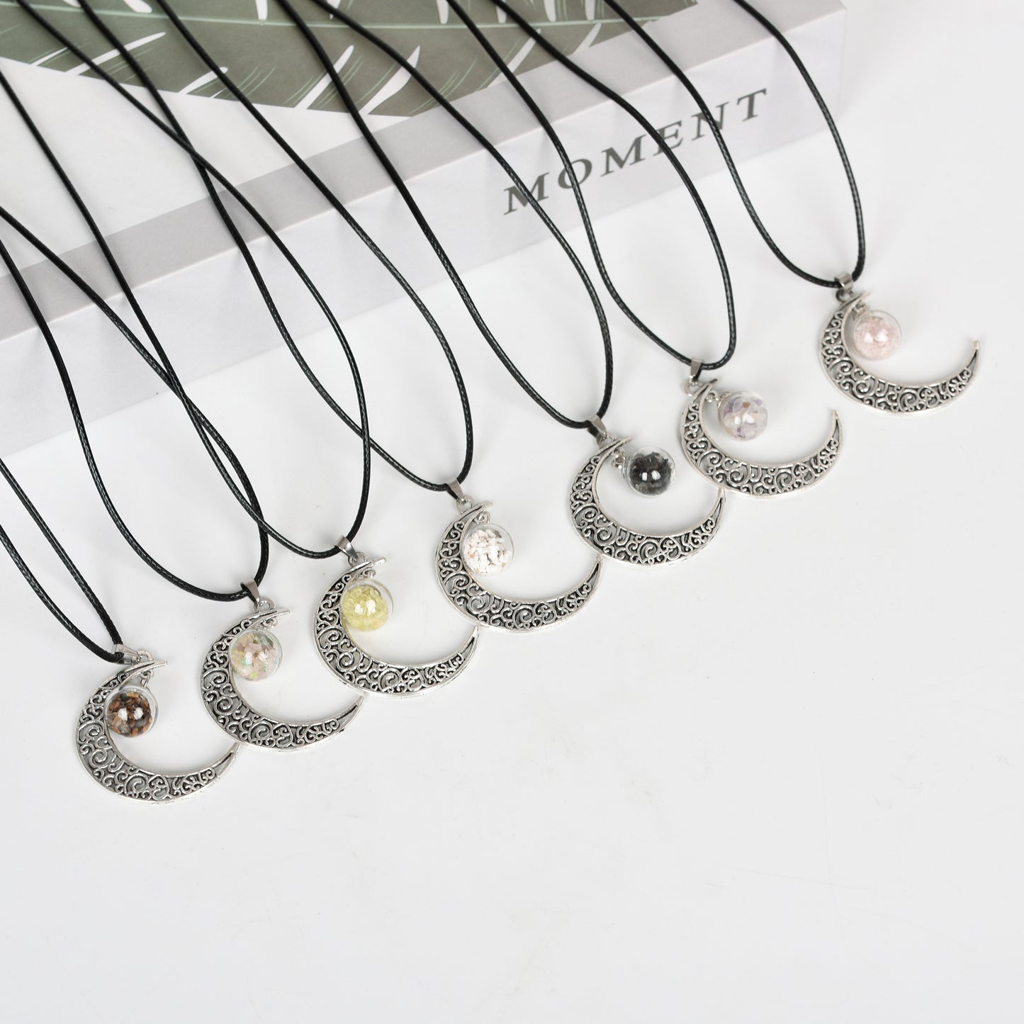 Moon with Chips in glass ball Pendant